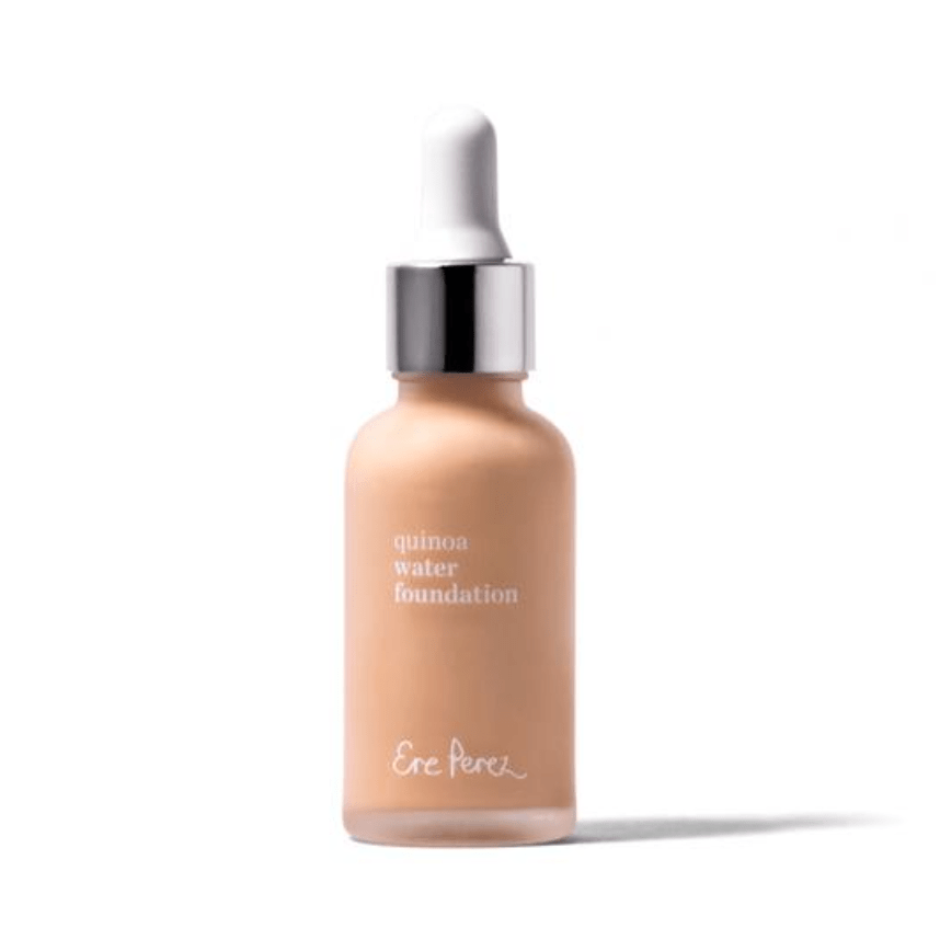 Glasflasche der Ere Perez Quinoa Foundation vor weißem Hintergrund.