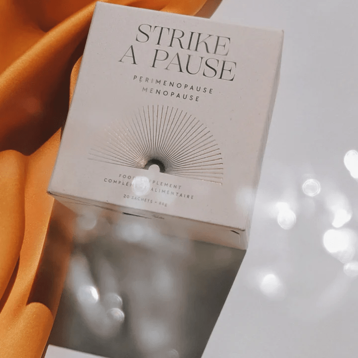 Depuravita Strike A Pause Verpackung vor hellem Hintergrund mit oranger Decke North Glow