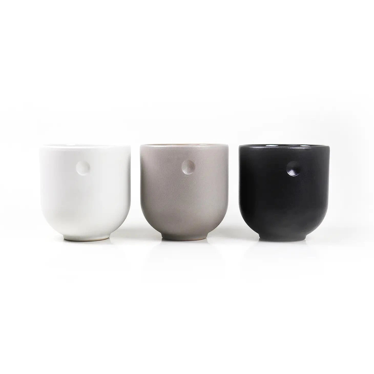 Stylish coffee and tea mug ceramic Ruhepunkt - black