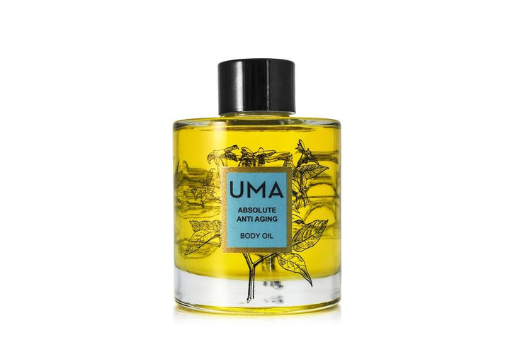 UMA Absolute Anti Aging Body Oil Flasche vor weißem Hintergrund.