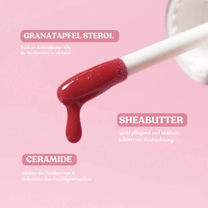 Balmy lip tint tip against a pink background 
