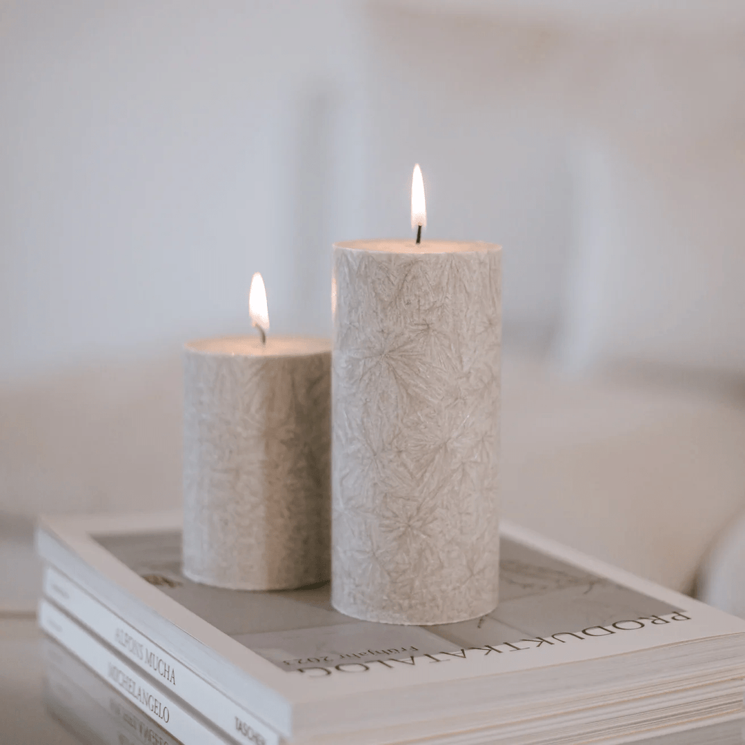 2 different sized block candles Olive from Eulenschnitt in gray are on product catalogs.