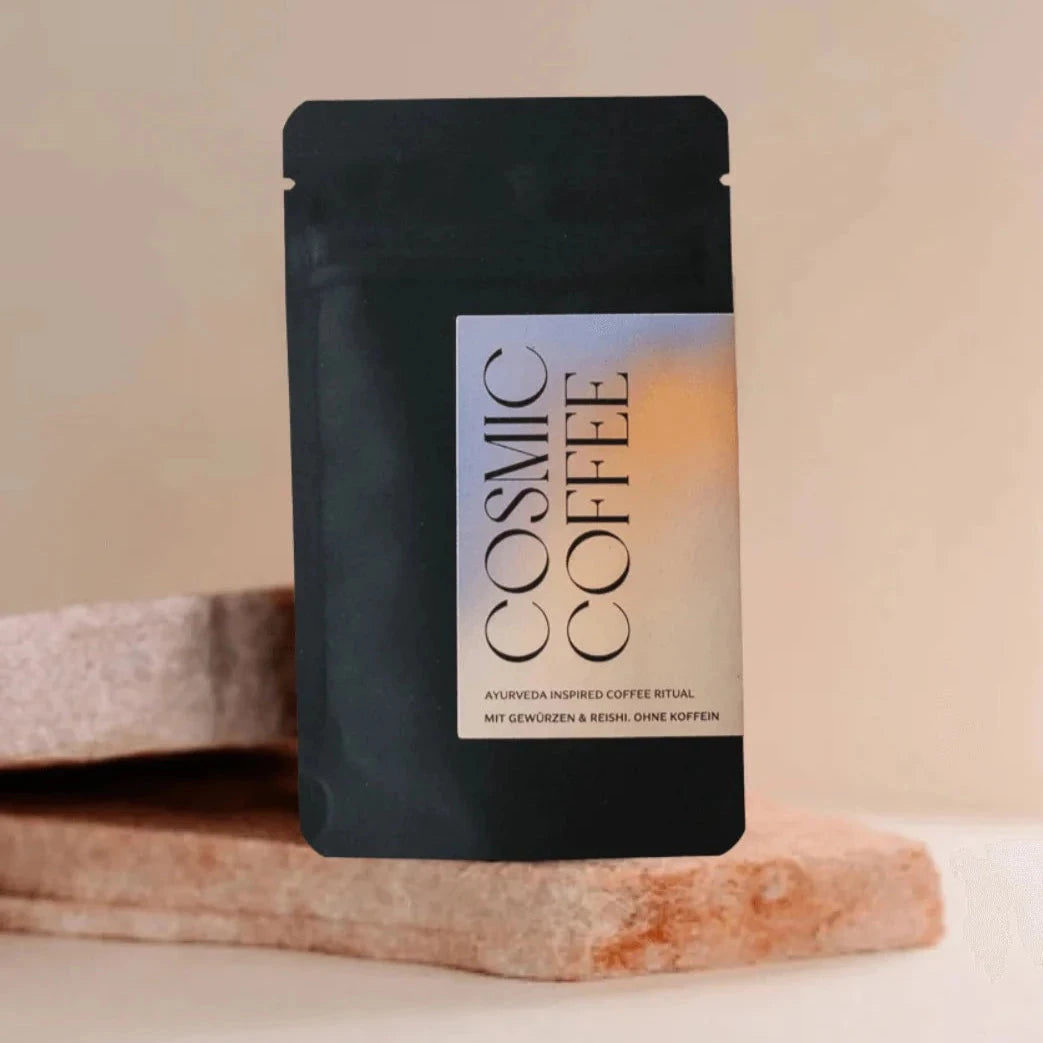 Ayurveda Soulfood Mini Cosmic Coffee bag on stone against light background North Glow