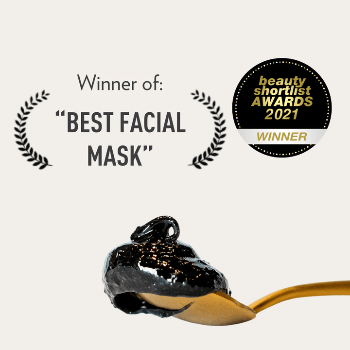 Dafna's Detoxify mask on a brass spoon under the lettering beauty shortlist AWARDS 2021