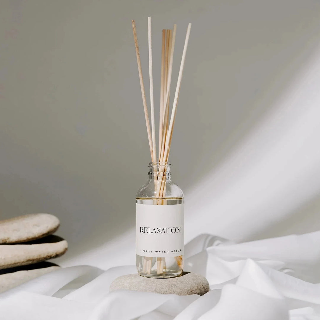 Sweet Water Decor Relaxation Diffuser on stone against a light background