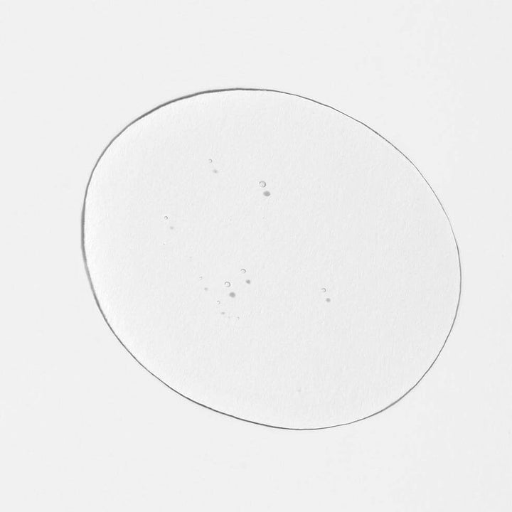 Texture example Harmonic Treatment Oil from Innersense on a white background