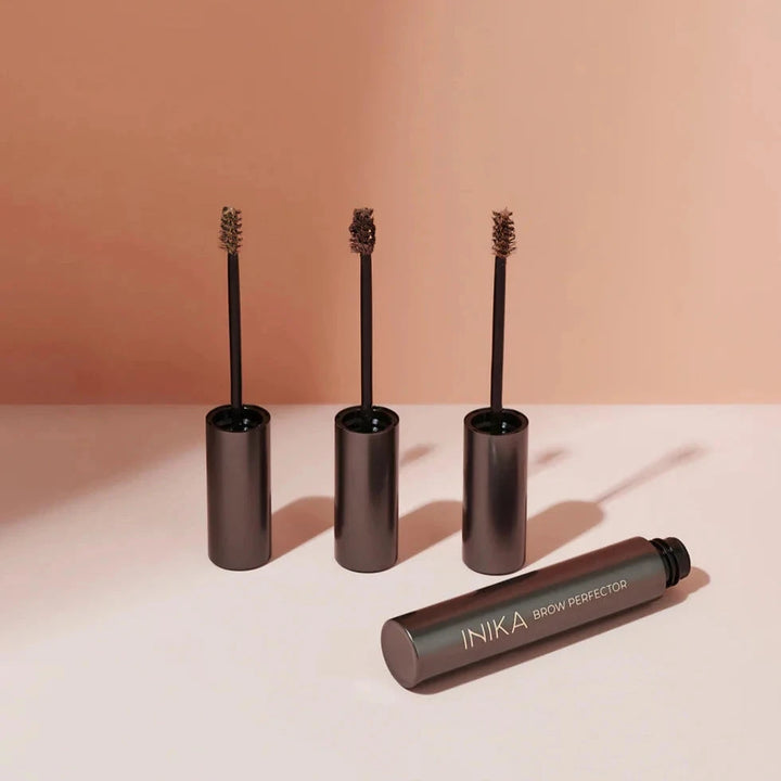 3 Inika Brow Perfector brush heads standing next to each other.