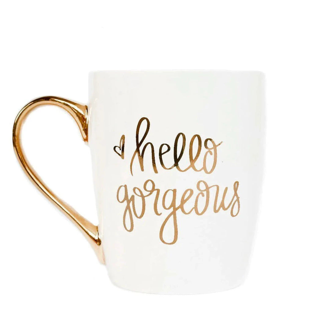 Hello Gorgeous" coffee mug in white and gold North Glow