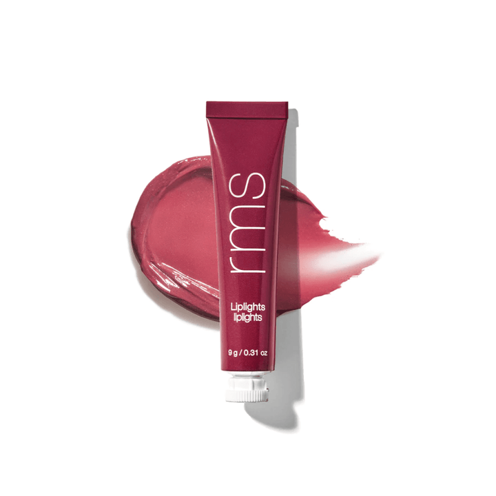 RMS Liplights Rhythm Tube in front of a color and texture sample against a white background.
