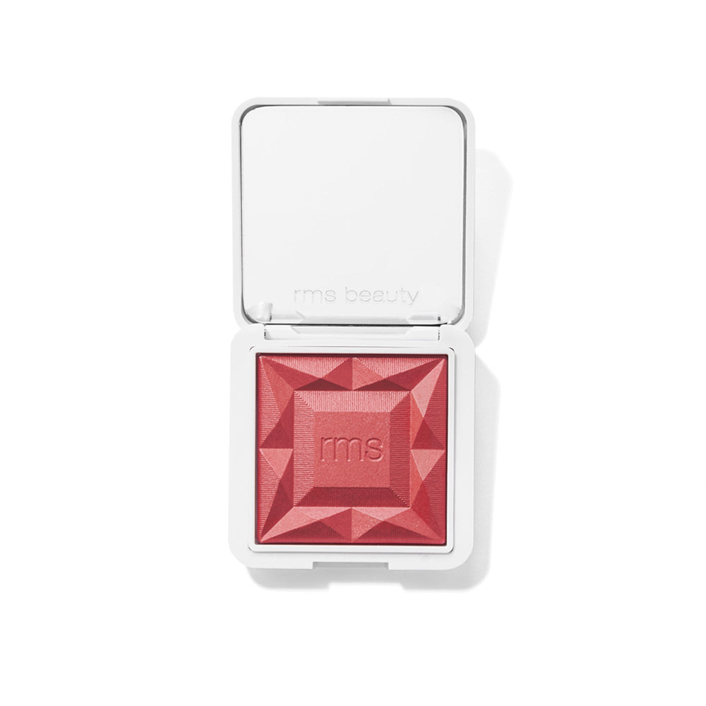 Open RMS Blush can Kir Royale against white background.