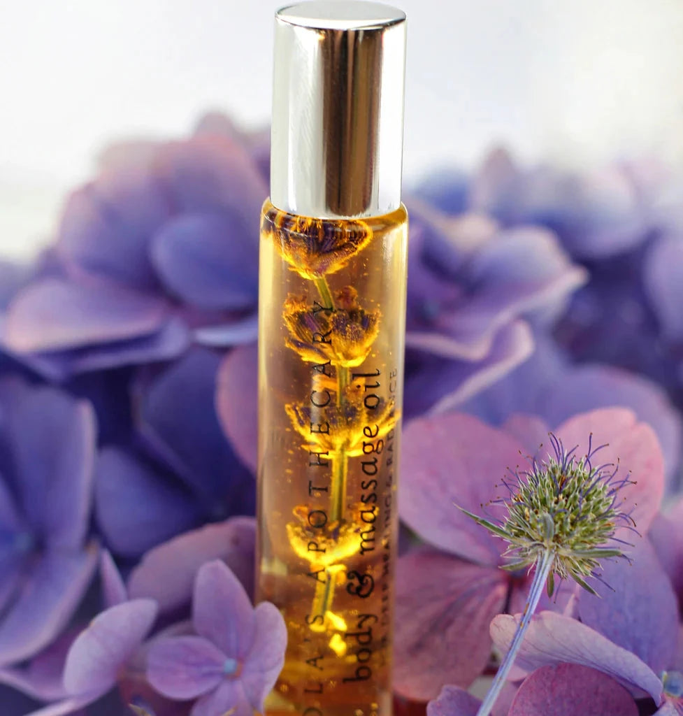 Lola's Apothecary deluxe roll-on Sweet Lullaby body and massage oil bottle in hydrangea