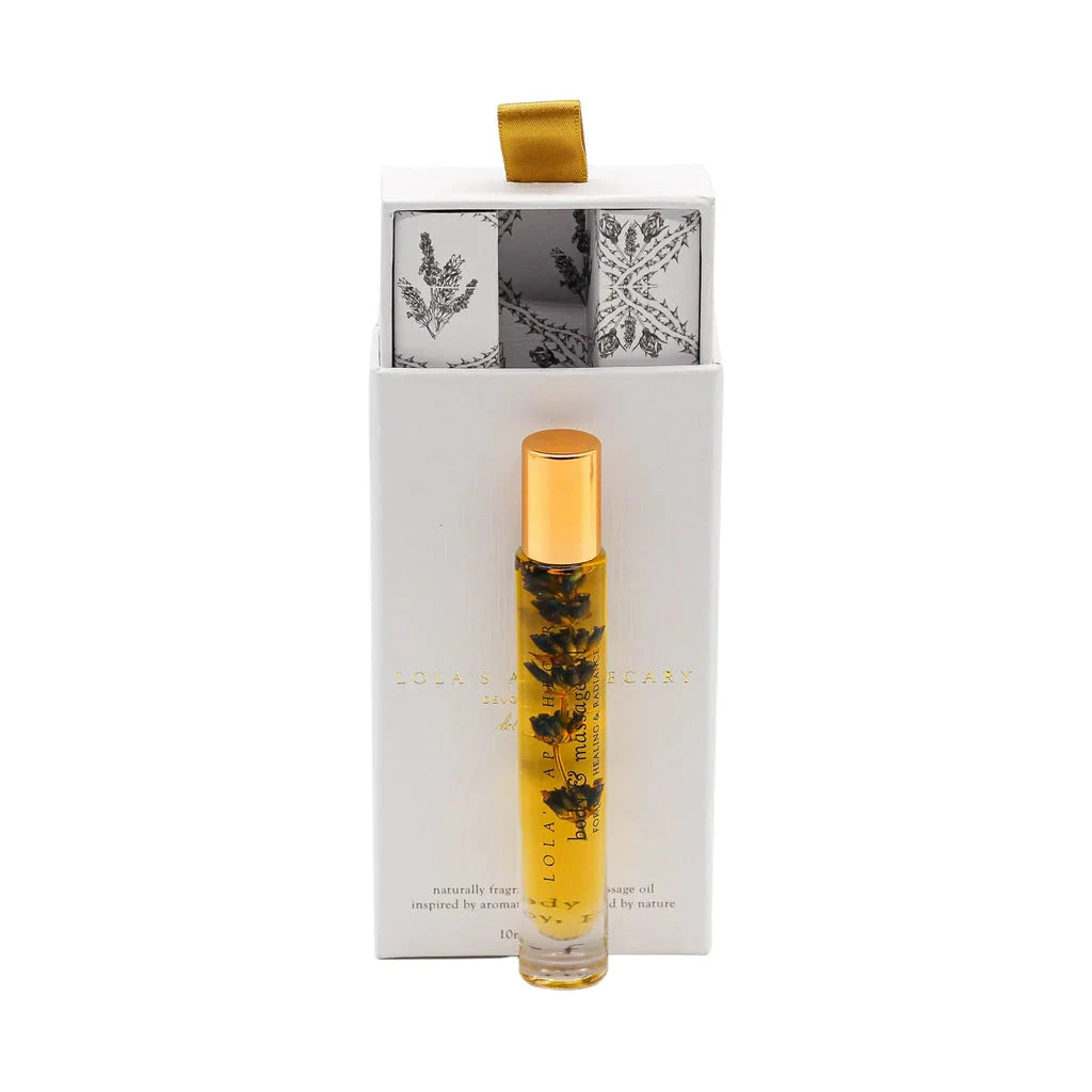 Lola's Apothecary deluxe roll -on Sweet Lullaby bottle in front of white gift box