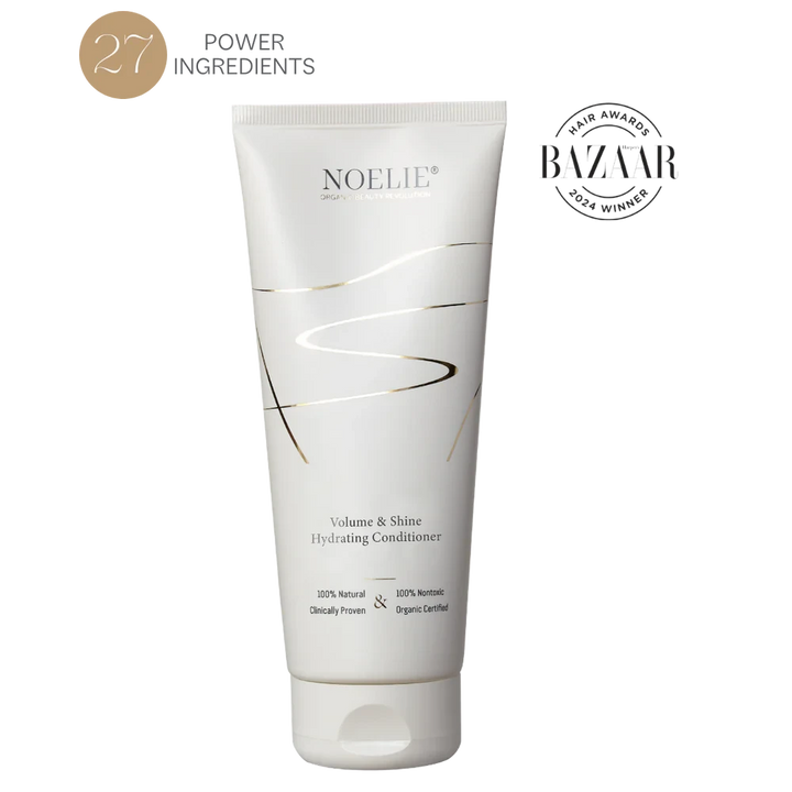NOELIE Volume & Shine Hydrating Conditioner vor weißem Hintergrund.