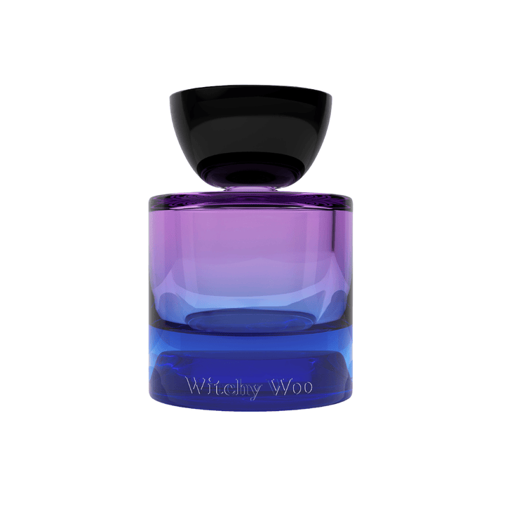 Blue-purple glass bottle with black lid - Vyrao Witchy Woo perfume.