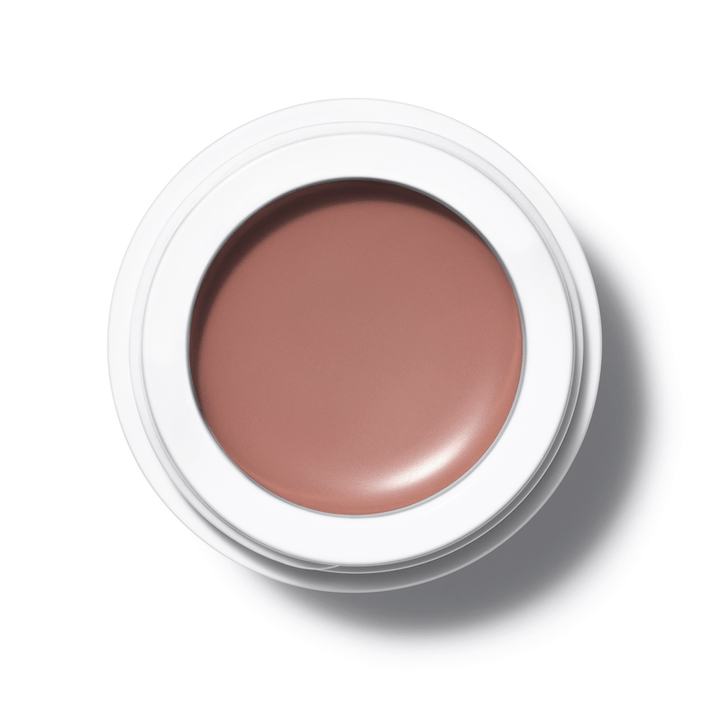 A bird's eye view of an open All Over Color Chamoisee jar on a white background.