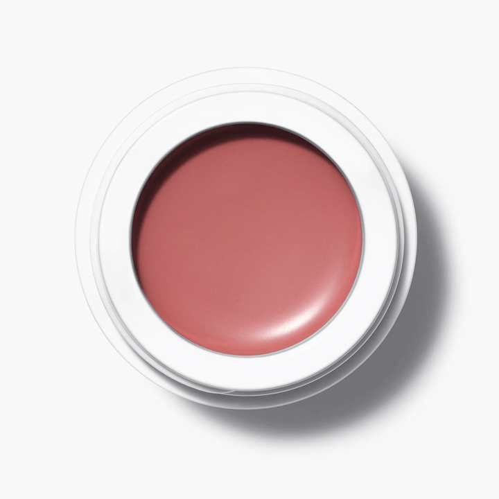 A bird's eye view of the open All Over Color Duras jar on a white background.