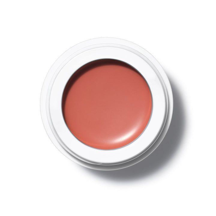 A bird's eye view of the open All Over Color jar Mangala on a white background.