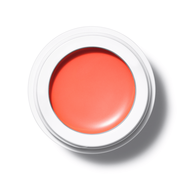 A bird's eye view of the open All Over Color Sanguinello jar on a white background.