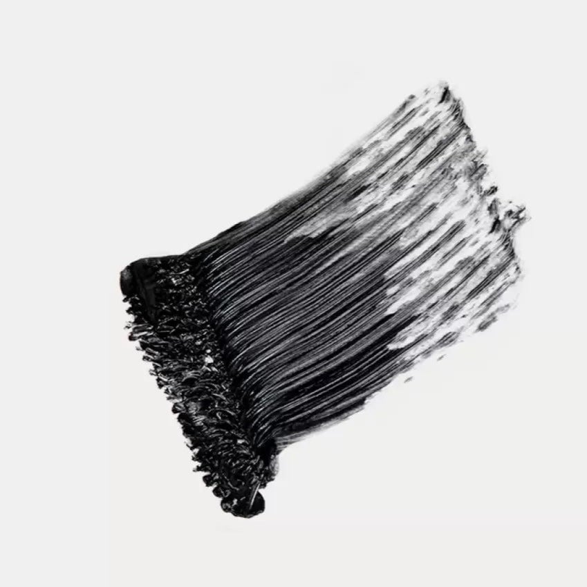 Ere Perez Avocado Mascara waterproof texture sample on white background.
