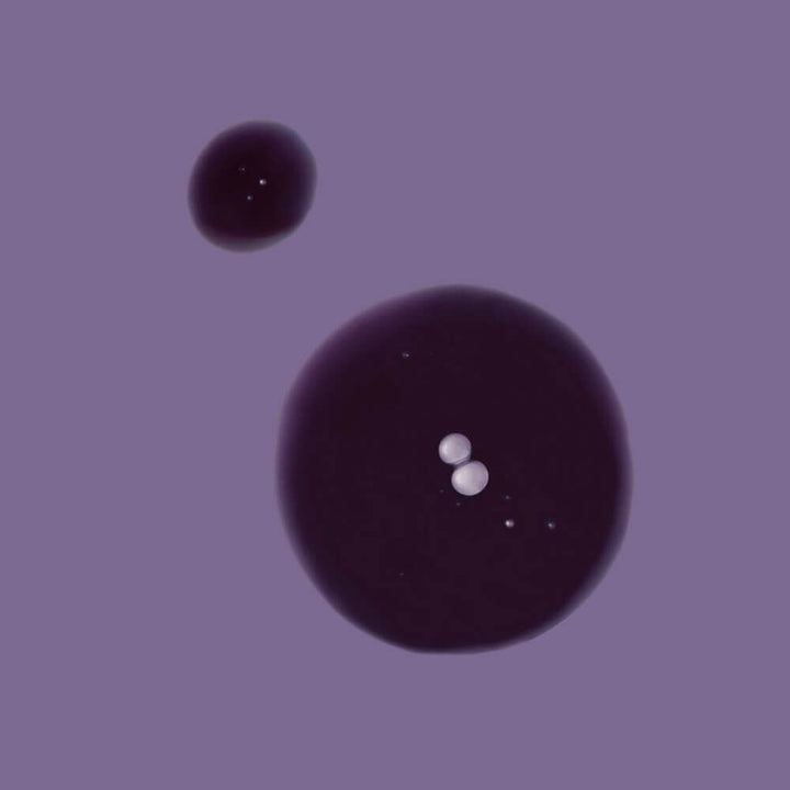 Innersense Bright Balance Shampoo texture example against a purple background.