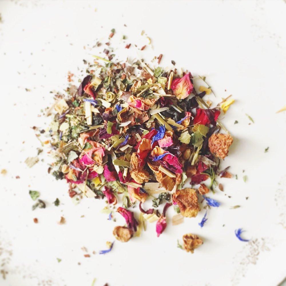 Lola's Apothecary Clementine Calamity Wellness Tea Consistent against a light background North Glow