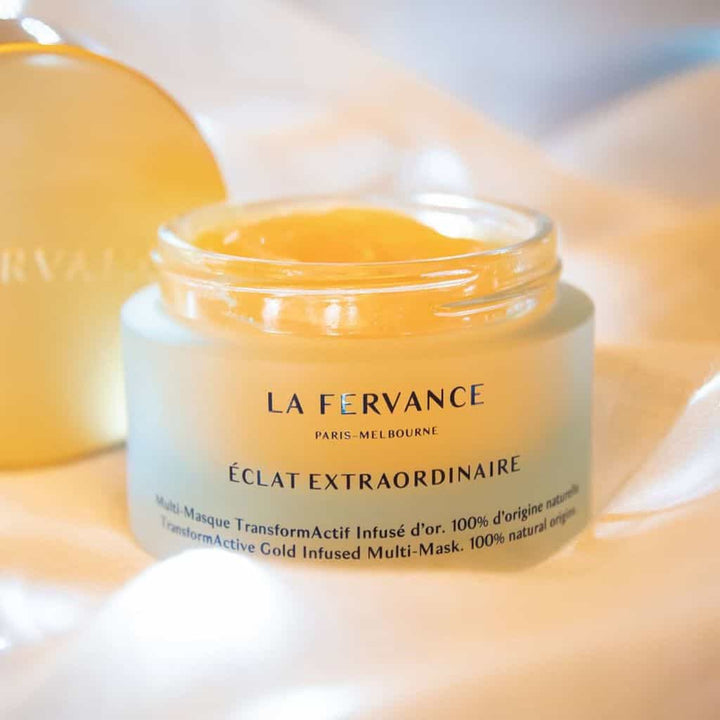 La Fervance Eclat Extraordinaire jar open on light blanket