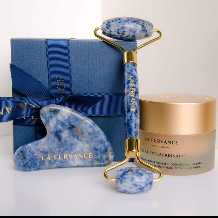 La Fervance Eclat Extraordinaire jar with blue gua sha and face roller North Glow