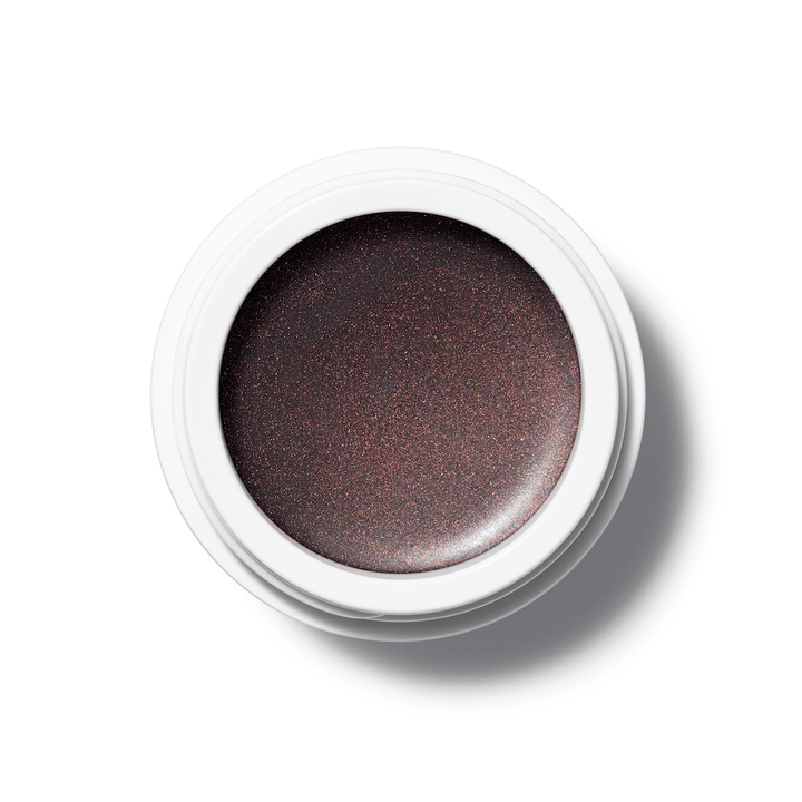 A bird's eye view of the open Eye Glow Color Jardin jar on a white background.