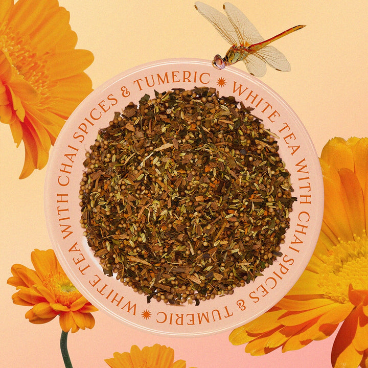 Loose tea Floating on a Chai High on a plate with flowers and dragonfly in the background.