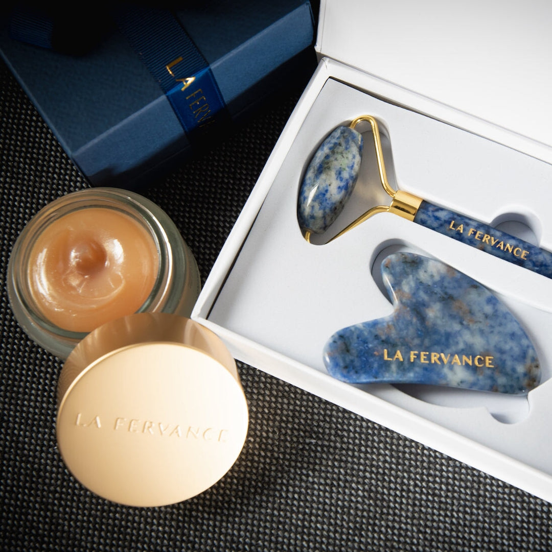 Gua Sha and face roller of blue sodalite as a combined anti-aging kit North Glow