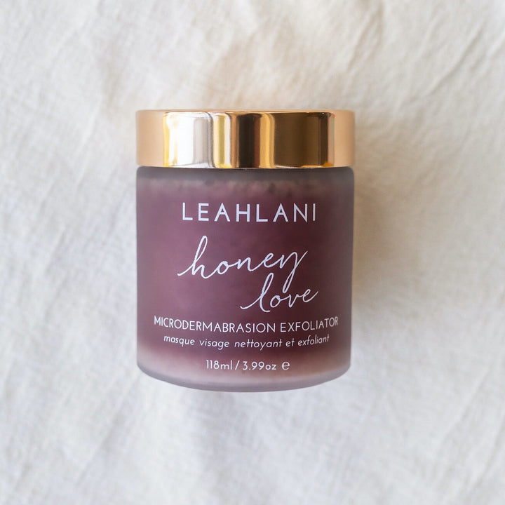 Leahlani Honey Love Exfoliator jar against light background