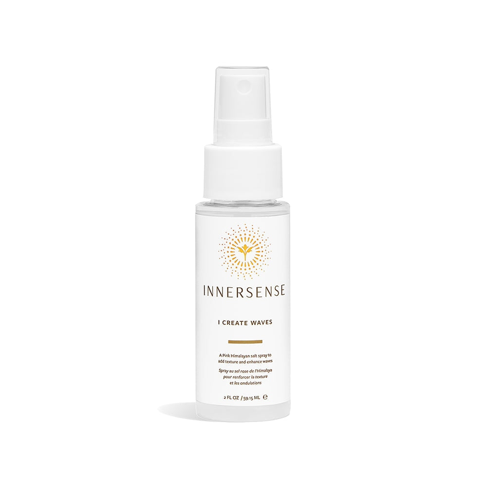 Innersense I Create Waves Travel Size Spray Bottle stands against a white background. North Glow