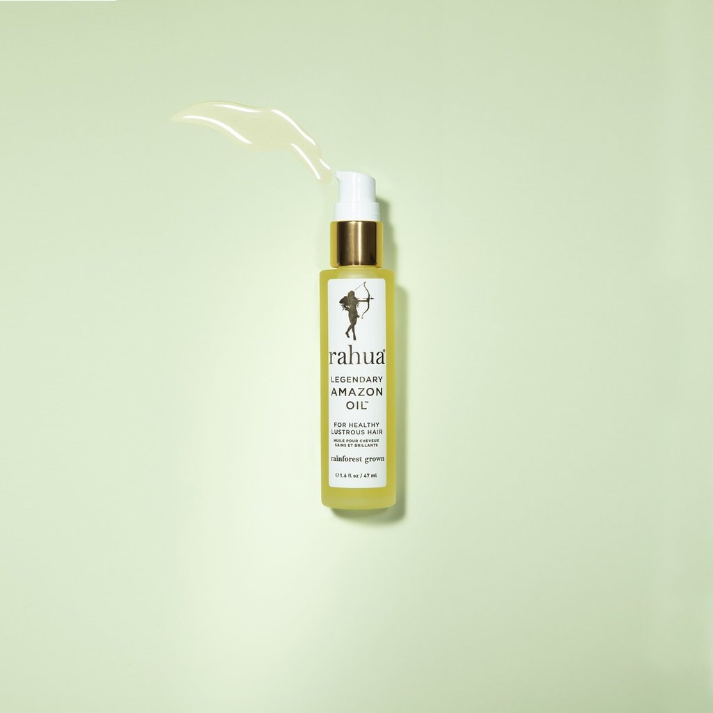 Rahua Legendary Amazon Oil bottle against a light green background. North Glow