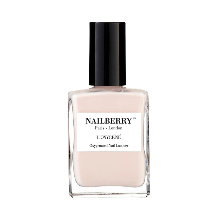 Nailberry nail polish bottle Almond against white background.