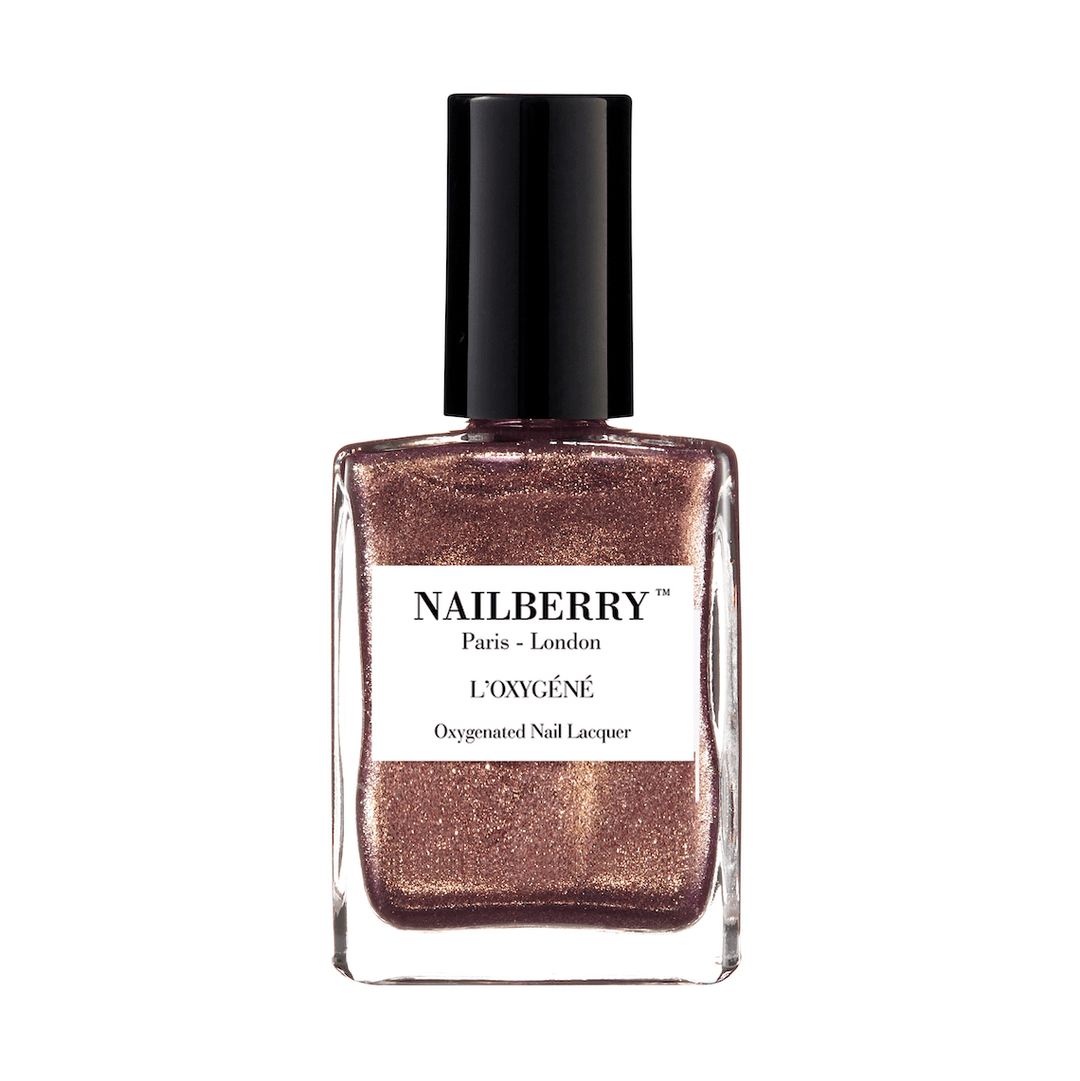 Nailberry nail polish bottle Pink Sand against white background.