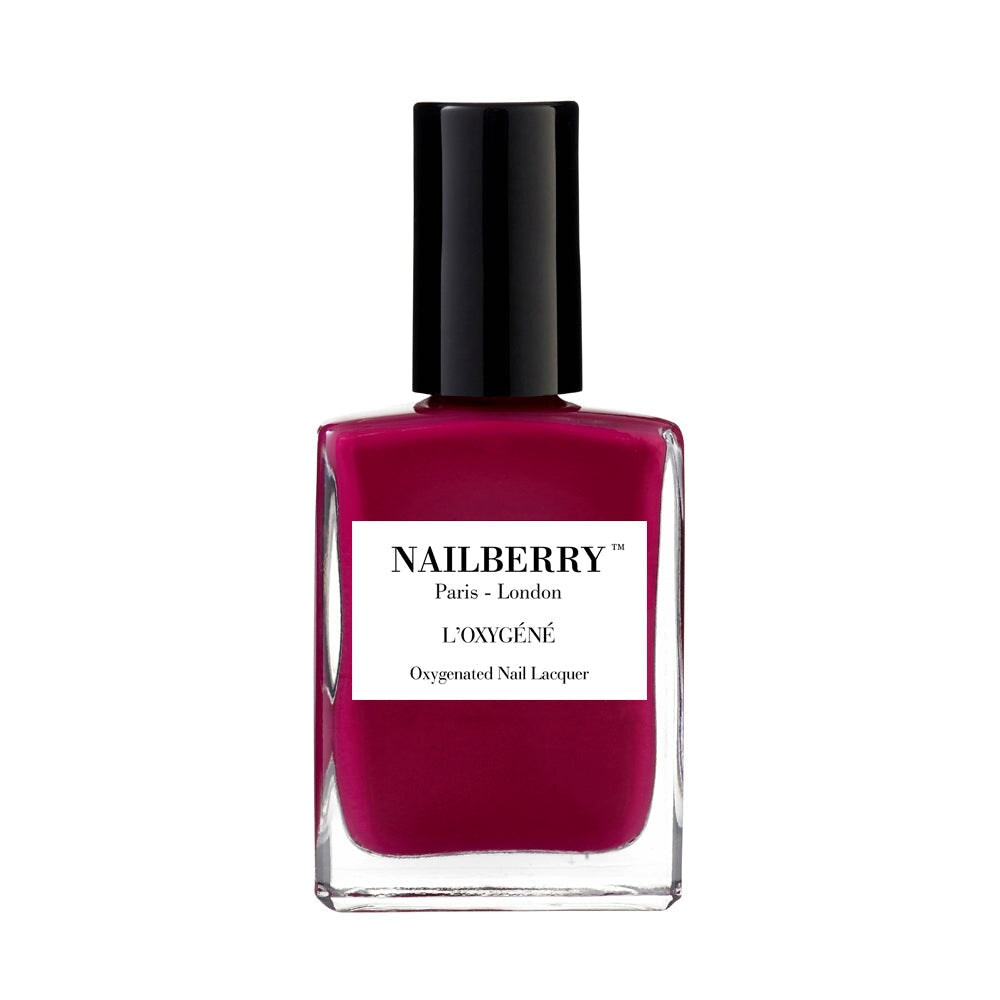 Nailberry nail polish bottle Raspberry against white background.