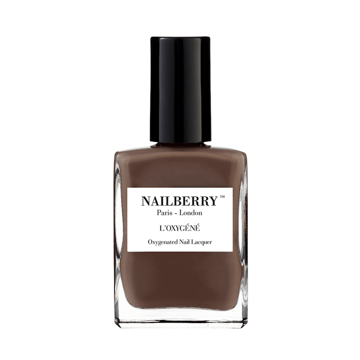 Nailberry nail polish bottle Taupe La against white background.