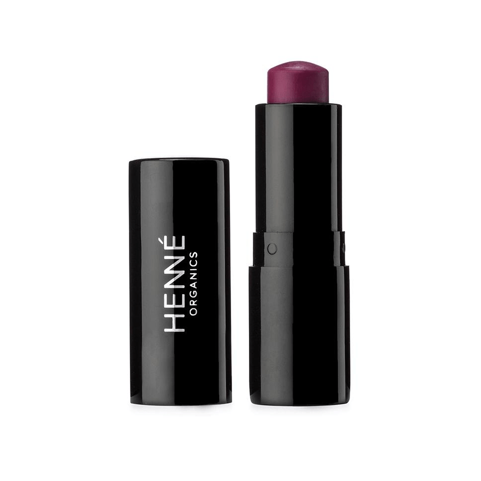 Offener Luxury Lip Tint Lippenstift der Farbe Muse vor weißem Untergrund. North Glow