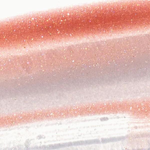 Color and texture example of the Ere Perez Mango Lip Honey lip gloss. North Glow