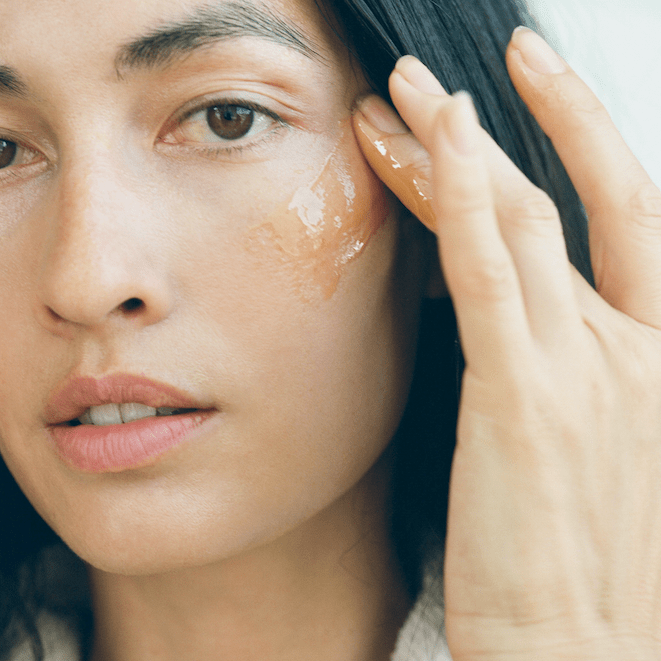 ACTIVIST Manuka Honey Mask on the face of the female model