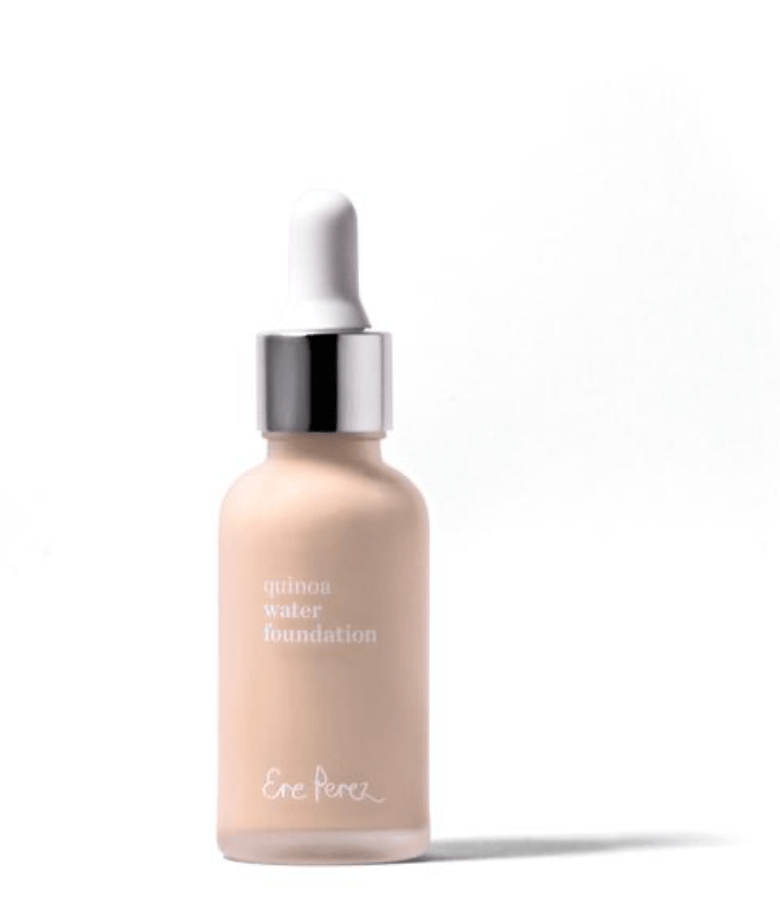 Glass bottle of the Ere Perez Quinoa Foundation against a white background. North Glow