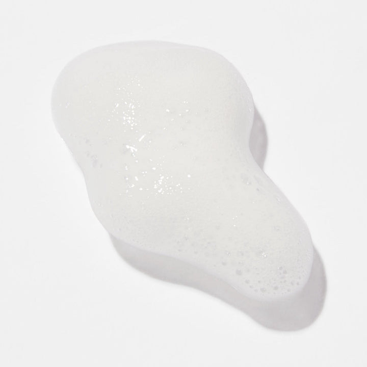 White foam on a white background, texture example for Innersense Refre dry shampoo.sh