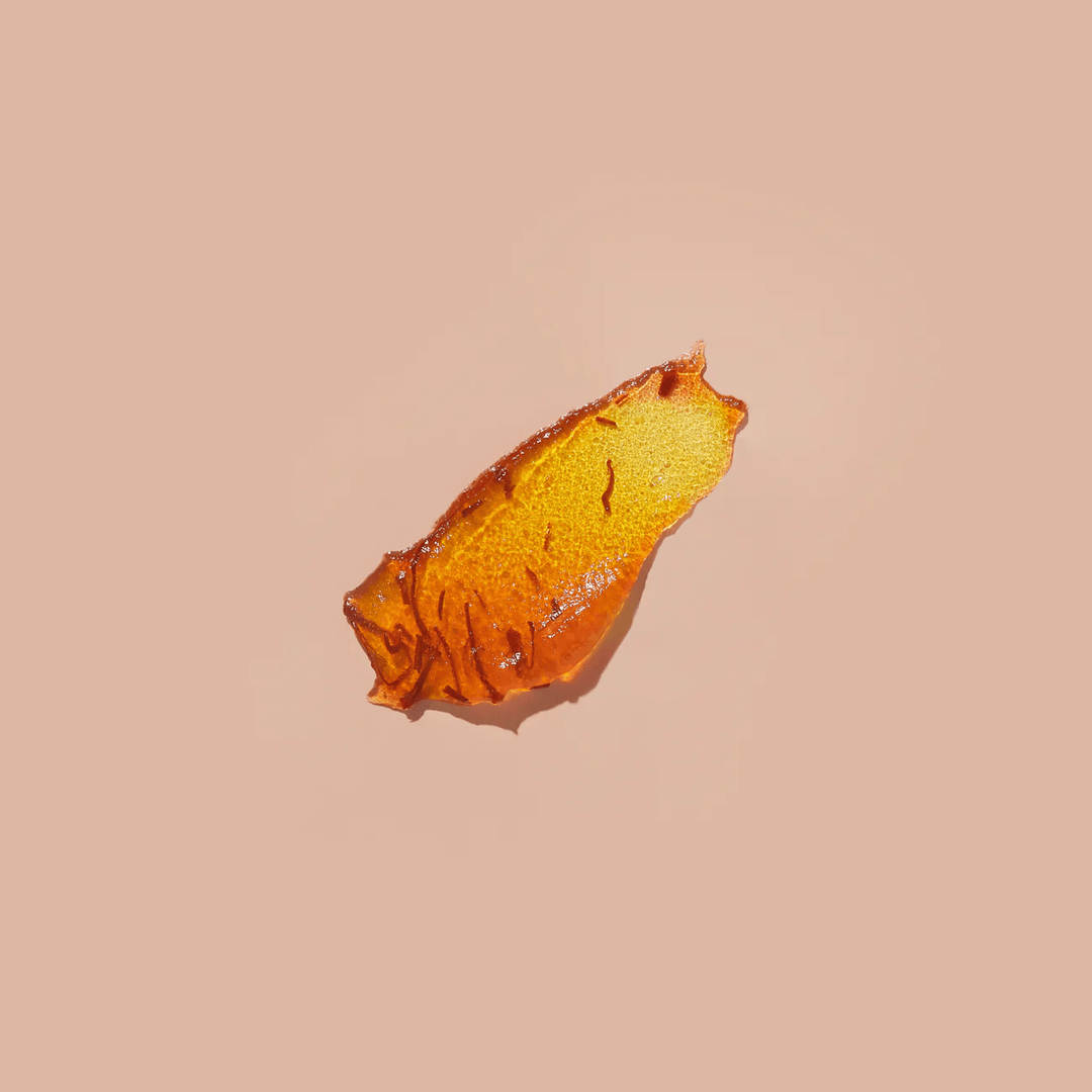 Ranavat Safron mask orange texture against orange background North Glow