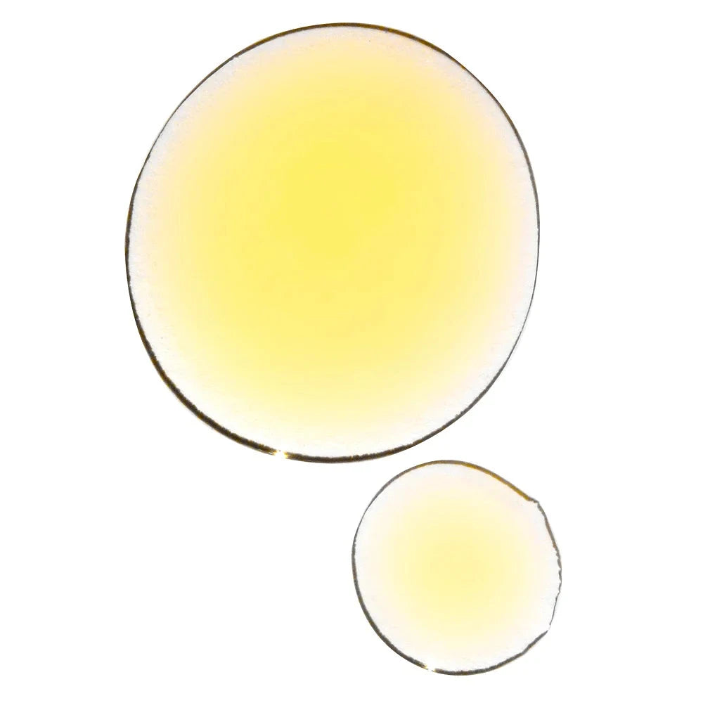 Texture example of the UMA Total Rejuvenation Face Oil. North Glow