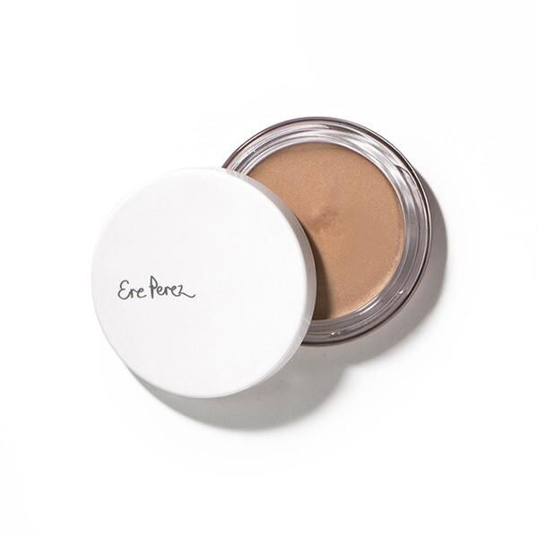 Open jar of Ere Perez Vanilla Highlighter Sun Halo on a white background.